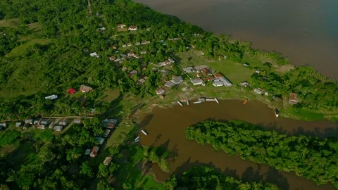 Small village on a side arm of the Amazon river, Peru Stock Footage 116396493