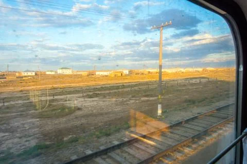 Small village thru the train window, Karakalpakstan Foto stock