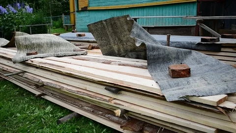 Small warehouse of new boards, the wind Stock Footage 116662749