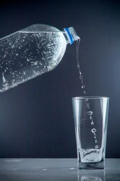 Small water bottle clear drinking cold mineral water Stock Photos