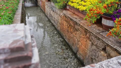 Small Water Channel in Lijiang Old Town 動画素材 312450853