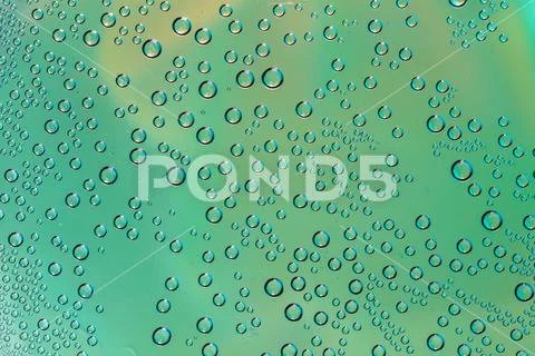 Small water drops on glass Stock Photos