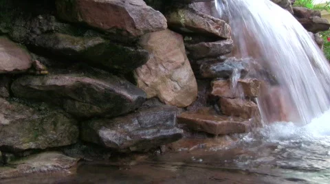 Small water fall with stacked rock Stockbeeldmateriaal 419233