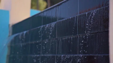 Small water flow Fountain Made of Wall Stock Footage 273070729