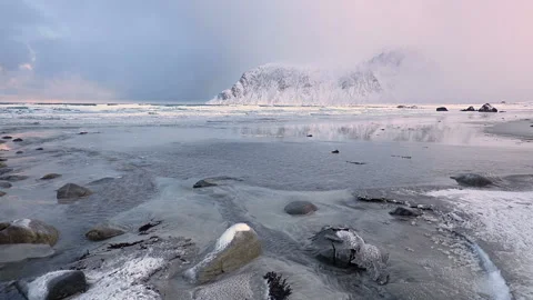 Small Water Flows on the Winter Beach Stock Footage 106462904