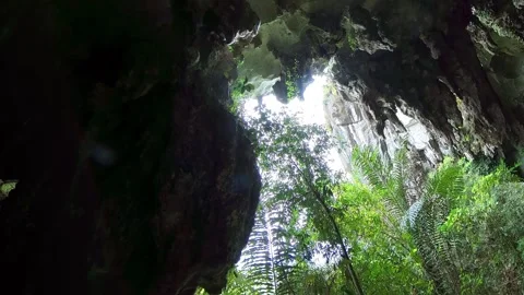 Small water rain drop in a big caves. Fairy caves, sarawak, kuching, malaysia Stock Footage 293774809