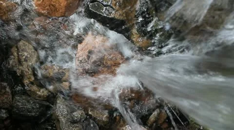Small Waterfall from above Stock Footage 10686276