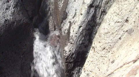 Small waterfall after snowmelt Stock Footage 52070665