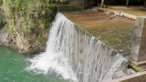 Small waterfall in Alps Stock Footage 317728926