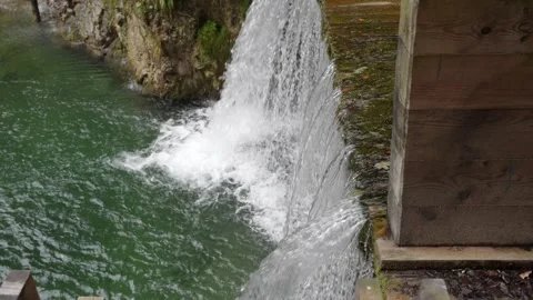 Small waterfall in Alps, Slow motion Stock Footage 317728896