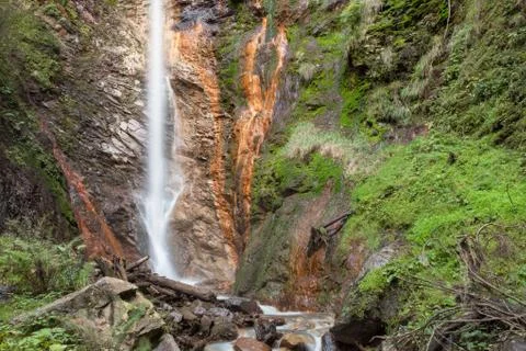 Small waterfall among the forest in val di Funes Stock-Fotos