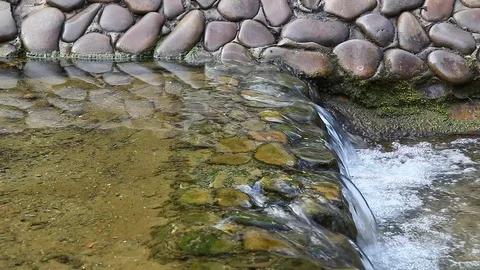 Small waterfall and clear water Stock Footage 78131682