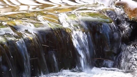 Small waterfall and clear water Stock Footage 78134824