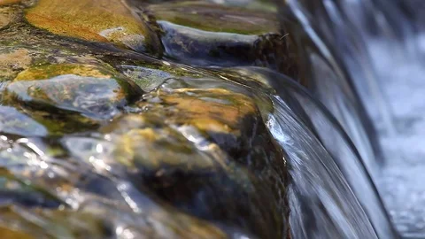 Small waterfall and clear water Stock Footage 78135345