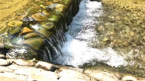 Small waterfall and clear water 库存影片 78233498