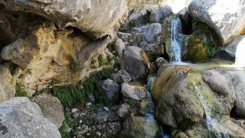 Small waterfall and rocks. Video stock 94603474