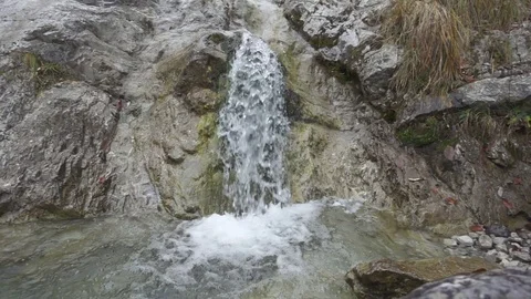Small Waterfall and Rocks in Slow Motion Stock Footage 83934113