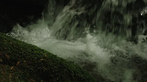 Small waterfall and stone with moss. Stock Footage 24821098