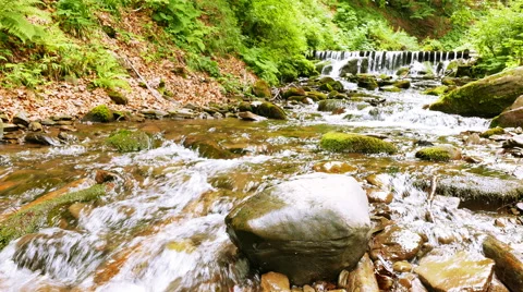  Small waterfall and stream in mountain sunner . 4K 3840x2160 Видео 53240470