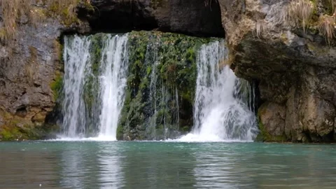 Small waterfall in the autumn forest Stock Footage 143388932