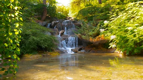 Small waterfall background in the park Stock Footage 63589117