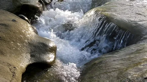 Small waterfall on beautiful river, stream flow Stock Footage 88398456
