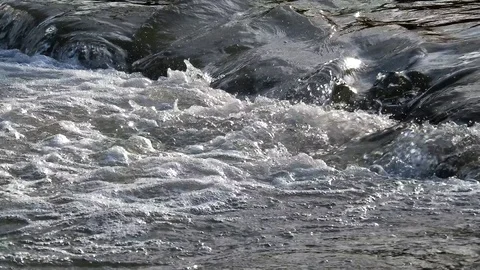 Small waterfall on beautiful river, stream flow Stock Footage 88399481