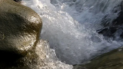 Small waterfall on beautiful river, stream flow Stock Footage 88399483