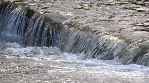 Small waterfall on beautiful river, stream flow Stock Footage 88399524