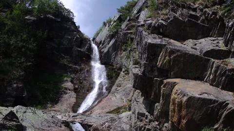 Small waterfall between the rocks Stock Footage 282778217