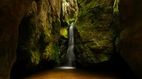 A small waterfall between rocks Stock Photos