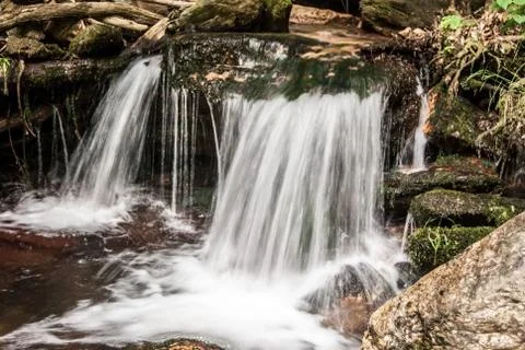 Small waterfall on Bila Opava river in Jeseniky mountains in Czech republic Stock Photos