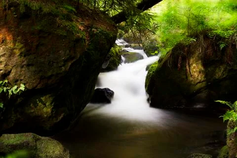 Small waterfall of an brook Stock Photos