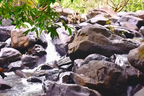 A small waterfall captured by high shutter speed Stock Photos