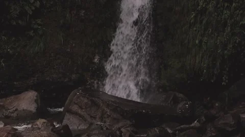 Small waterfall cascade falling down a rocky slope. HD. Video stock 138716603
