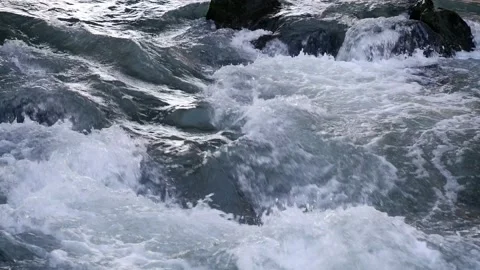 A small waterfall on a cascade of ponds Видео 171404920