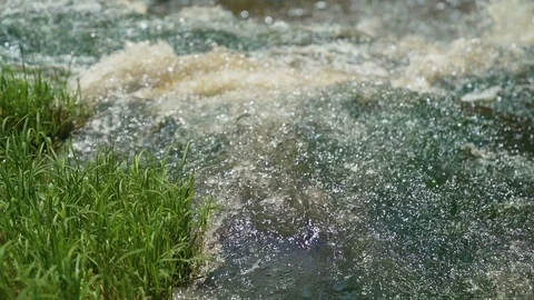 Small Waterfall Cascading over Rocks in Tropical Forest. Slow motion Stock Footage 92519206