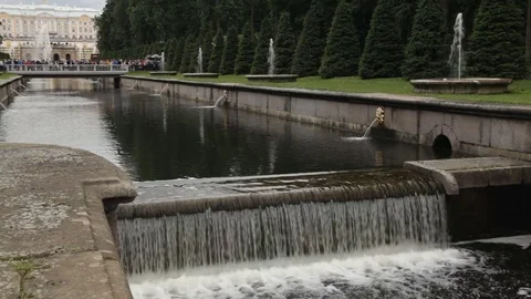 A small waterfall on the channel in Peterhof Stock-Footage 71666864