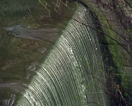 Small waterfall in a city park Stock Footage 25364692