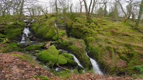 Small waterfall in the Cumbrian Lake District, just outside the village of .. Stock Footage 237362215