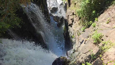 Small Waterfall Dropping Through Rocky Gorge From Above, Iguazu, Argentina 8K Stock Footage 306473583