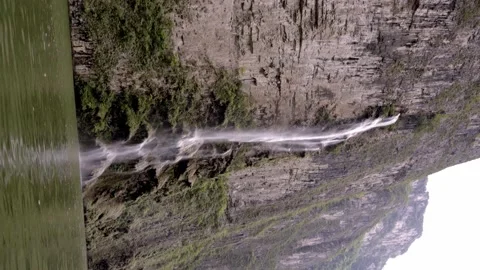 Small waterfall falling into the Grijalva River in the Sumidero Canyon Stock Footage 221804010