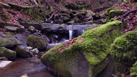 Small waterfall flowing down river at brynmawr viaduct southwales uk Stock Footage 148478425