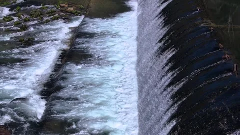 Small Waterfall Flowing Down The River Vídeos de archivo 304662255