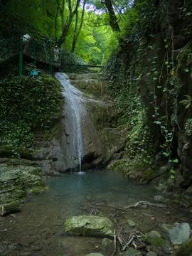 A small waterfall flows Stock Photos