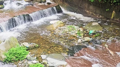 A small waterfall that is. Stock Footage 282841587
