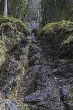 A small waterfall in forest from briidge Stock Photos