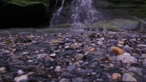 Small waterfall in a forest in Cornwall, England Stock Footage 74078581