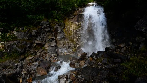 Small waterfall in the forest Stock Footage 95828435