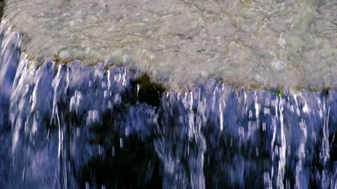 Small waterfall in the forest Stock Footage 147646165